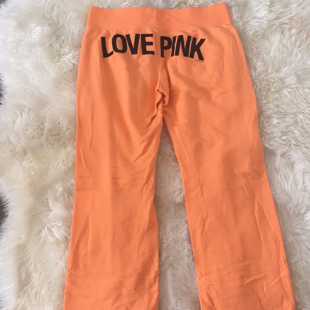 Orange Victoria’s Secret sweat pants
